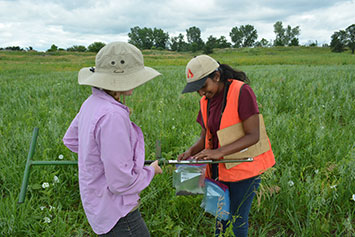 Two women looking at bags. Link to Life Stage Gift Planner Ages 60-70 Situations. Two women looking at bags. Link to Life Stage Gift Planner Ages 60-70 Situations.